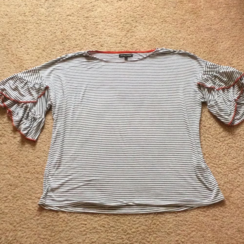 Black & white striped tee with orange detailing